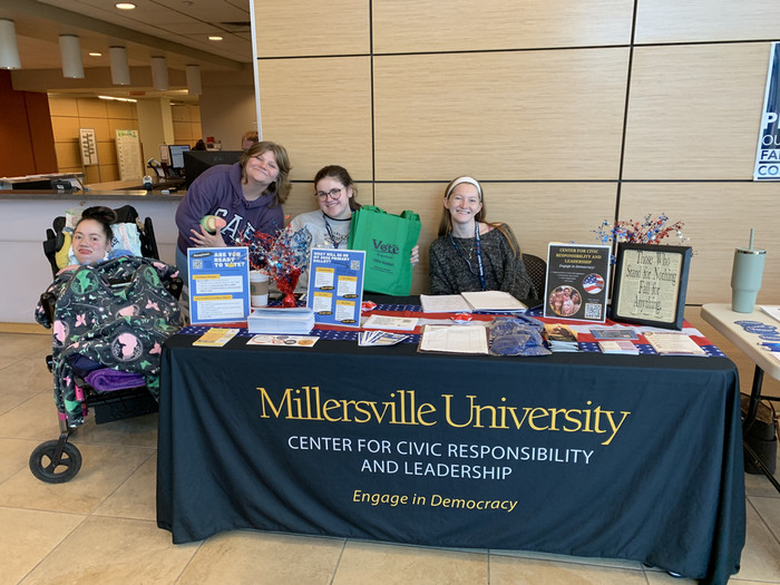 CCE fellows tabling at McNairy Library