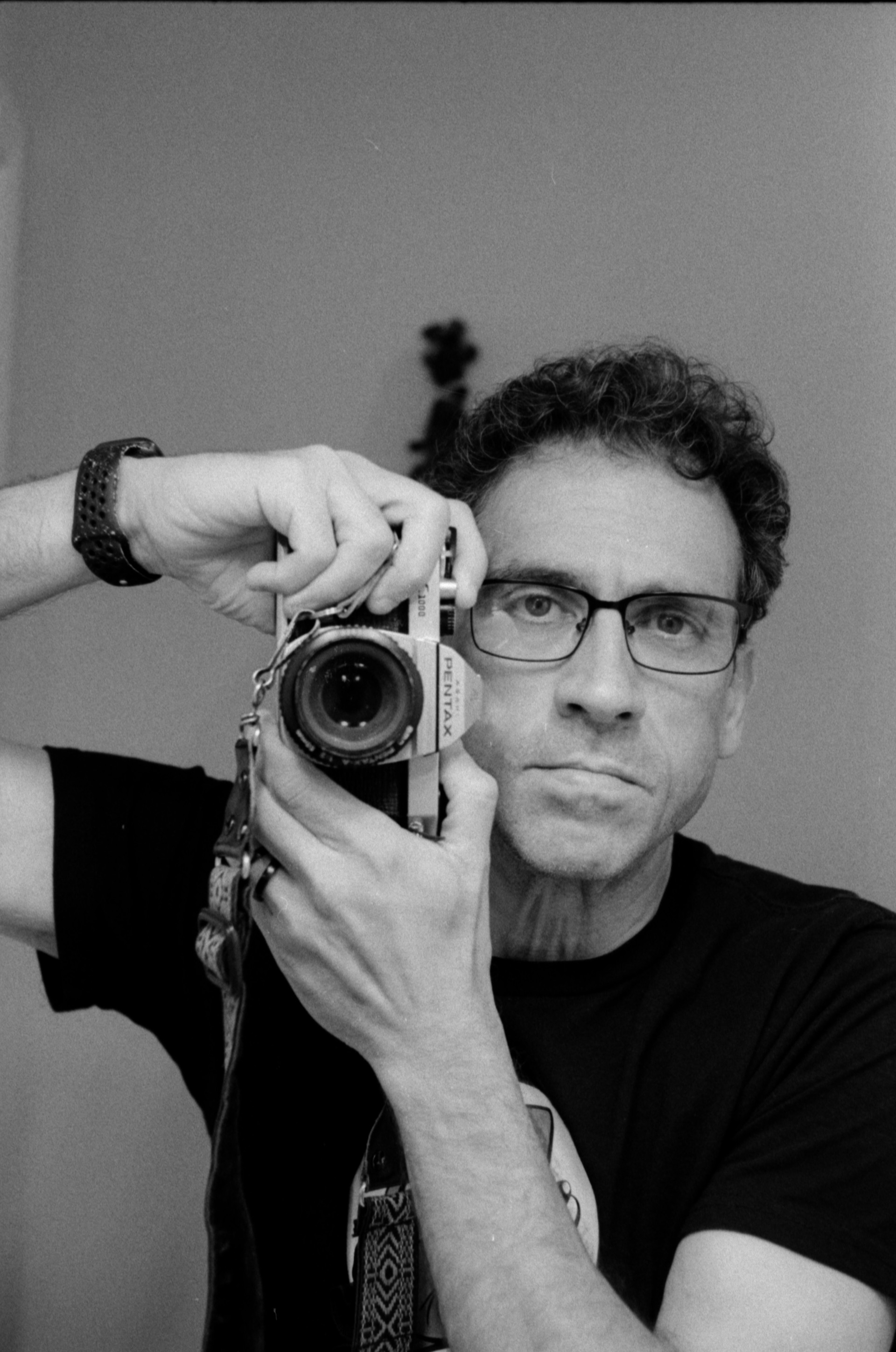 Mr. James E. Machado, MFA
