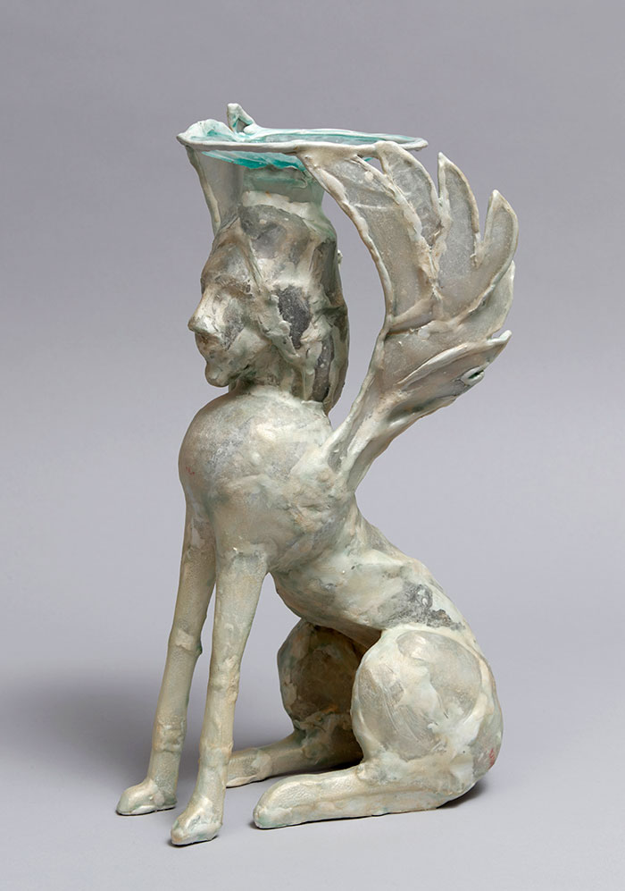 4. Shari Mendelson, Seated Sphinx, 2019, 13 x 6 x 7 inches, Repurposed plastic, hot glue, resin, acrylic polymer, mica Photo by Alan Wiener