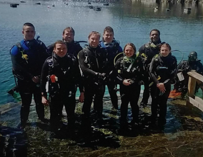 MU Ocean Science Club students in scuba gear posing for picture.
