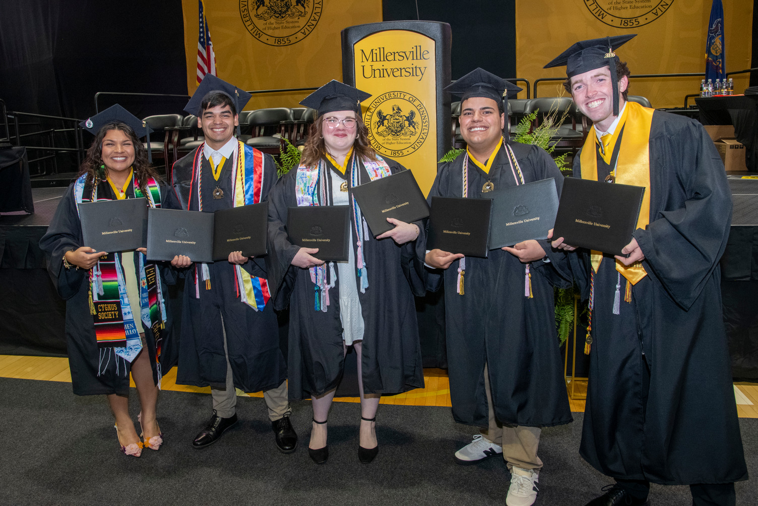 Five students at spring 2026 graduation