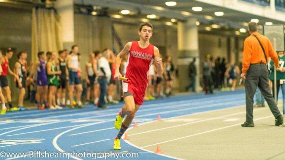 Anthony Tirado participating in track event