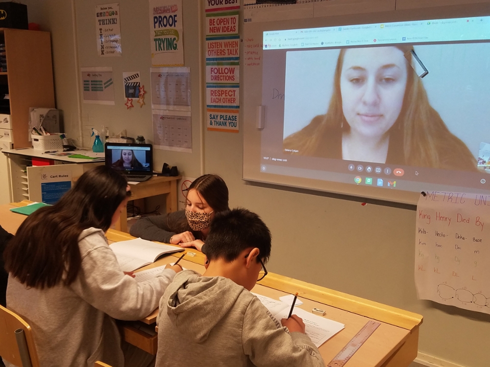 Student studying abroad in Sweden teaches remotely.