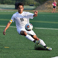 College student playing soccer