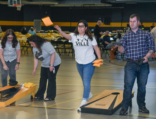 MU employees play corn hole