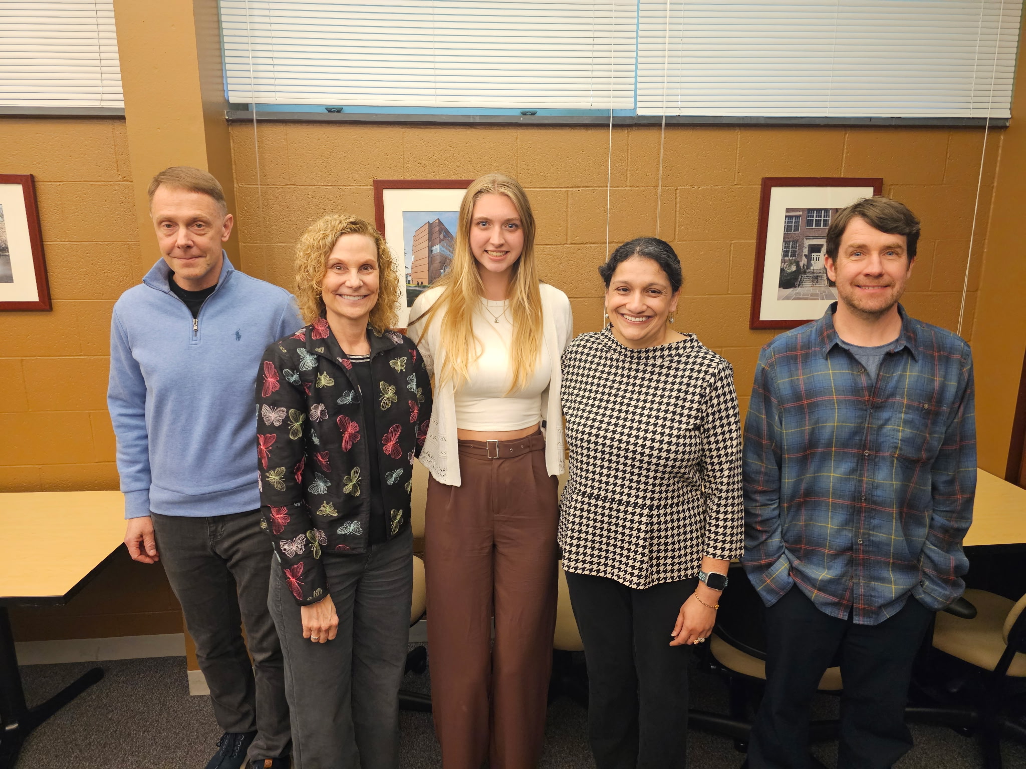 Her committee from left: Dr. Adam Lawrence (Government), Dr. Rika Schmitt (Dept. Chair for Sociology/Criminology), Lyndsey Kregel, Dr. Nitu Bagchi (Government) and Dr. Ryan Orr (Sociology).