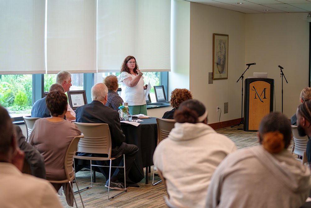 Cristi Hahn presenting to the audience
