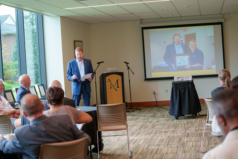 Jeffrey Lange giving a speech to the audience